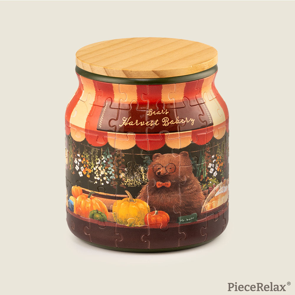Step into the cozy world of Bear's Harvest Bakery, where our adorable bear owner busily bakes delicious bread using seasonal pumpkins! Whether placed on your kitchen counter or as a charming centerpiece on your dining table, PieceRelax Puzzle Jar adds a touch of whimsy and seasonal joy to any space.