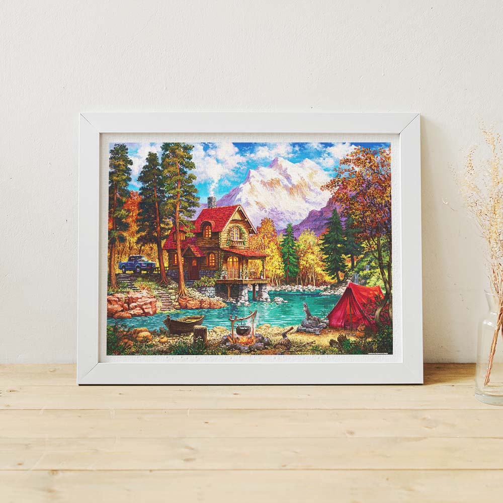 PieceRelax | 1200 piece puzzle. Escape to tranquility with PieceRelax puzzle. This picturesque scene includes a cozy cabin by the lake and a majestic mountain backdrop.