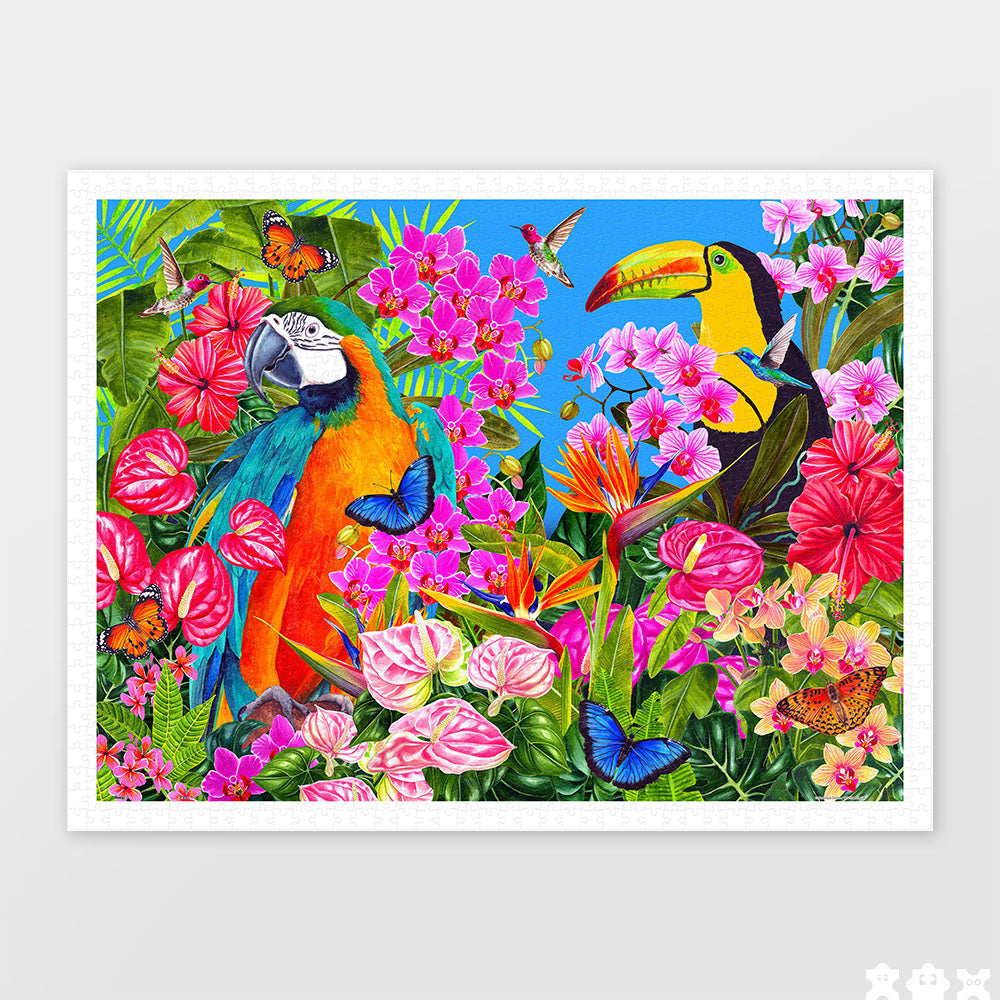 PieceRelax | 1200 piece puzzle. Discover the vibrant colors of 'Tropical Paradise' with PieceRelax. This lively scene is filled with exotic flowers and birds, bringing a burst of tropical life into your home.
