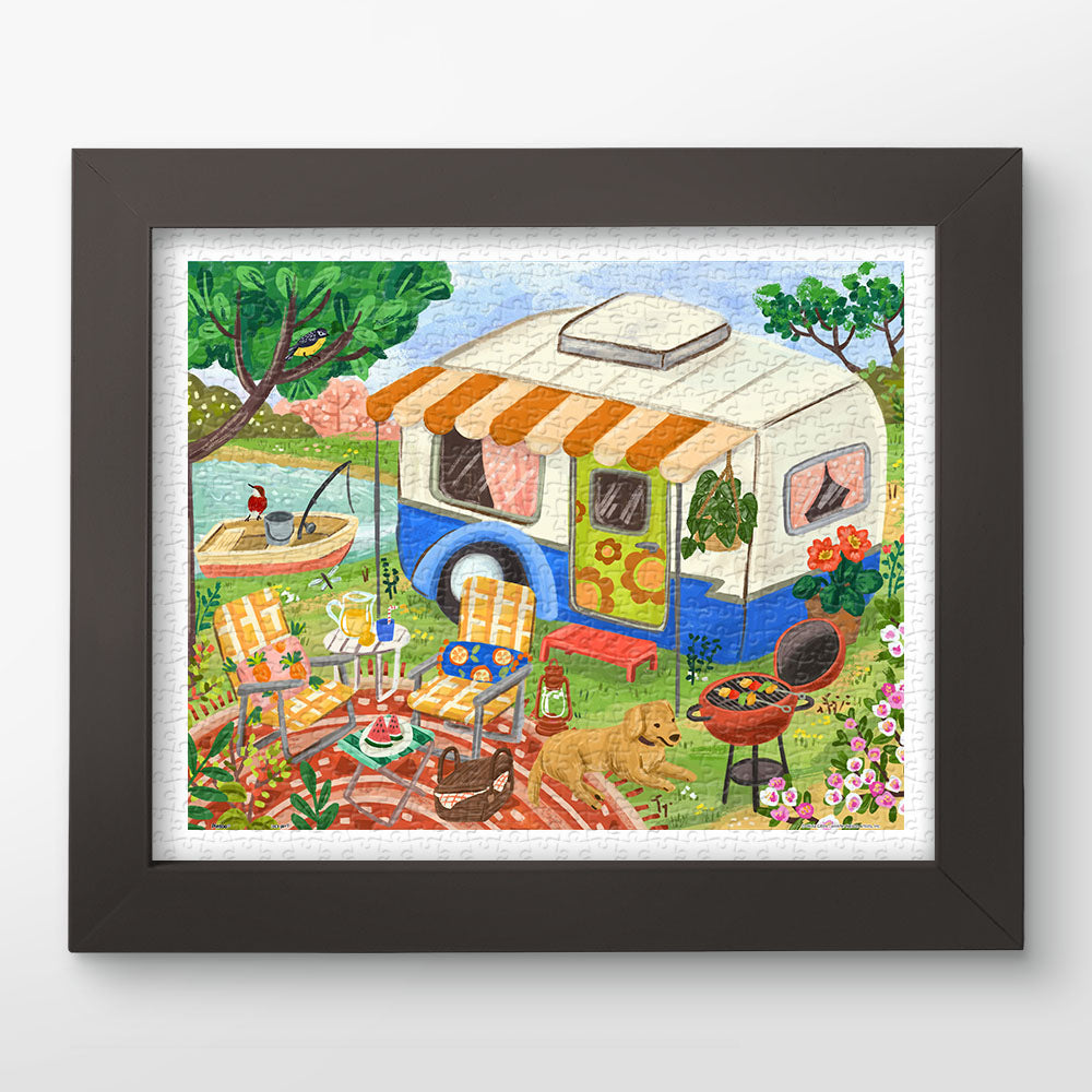 PieceRelax|Escape to the great outdoors! Enjoy the peaceful scene of a cozy camper, BBQ, and lakeside fishing, perfect for puzzle lovers who dream of a relaxing getaway. Piece by piece, you’ll discover joy, because at PieceRelax, you’ll always get there.