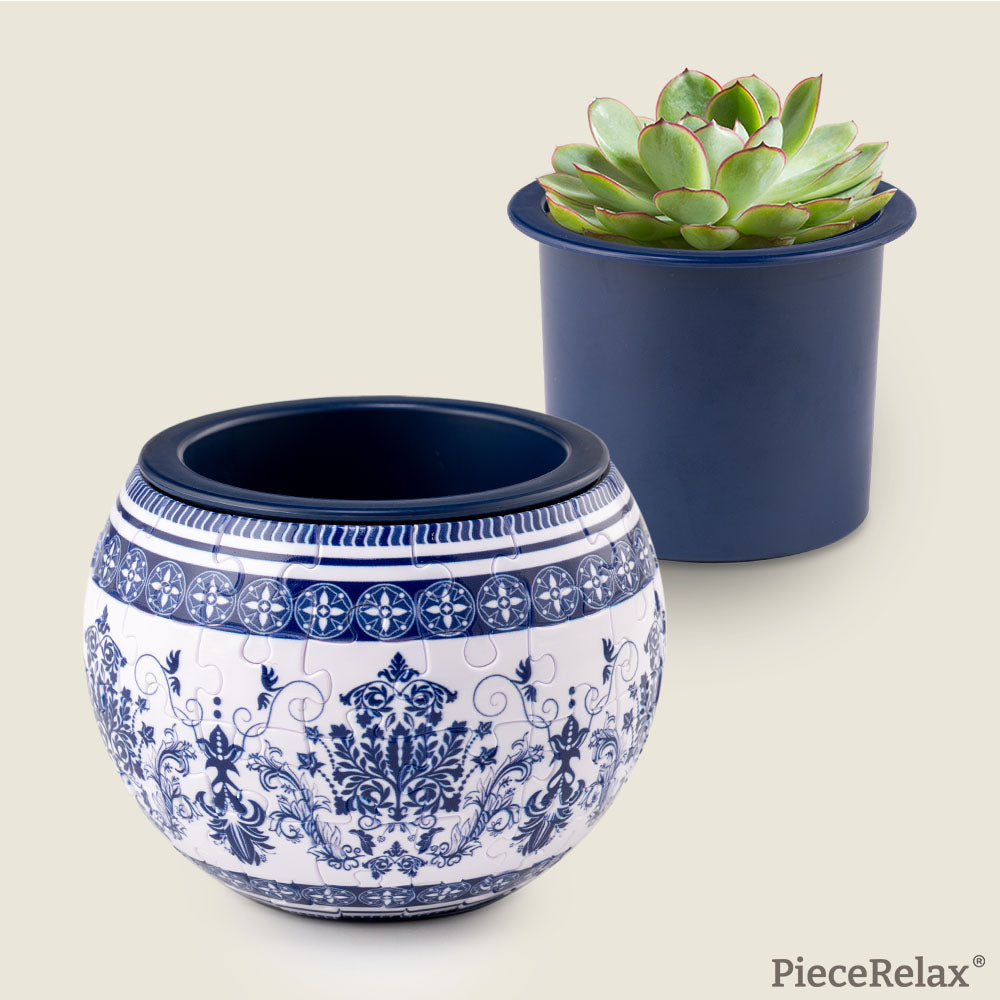 Drawing from Eastern floral tiles and echoing the elegance of blue-and-white porcelain, the PieceRelax puzzle planter radiates classical beauty. Allow your creativity to blossom with PieceRelax, where each plant finds its perfect place within the allure of this stunning puzzle plant pot.