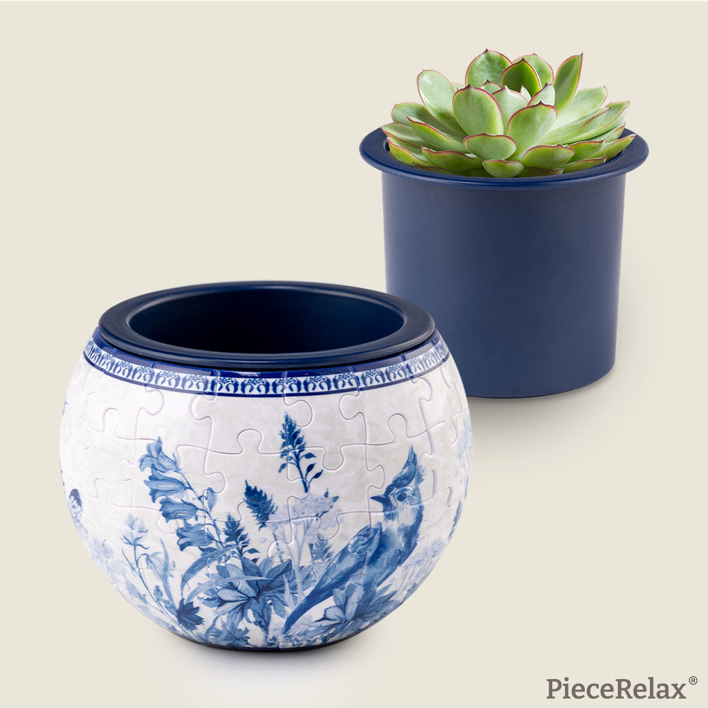 This exquisite plant pot showcases intricate blue birds and delicate floral patterns, perfect for adding a touch of elegance to your indoor garden. With PieceRelax Puzzle Planter, every piece falls into place beautifully, ensuring you'll always get there.