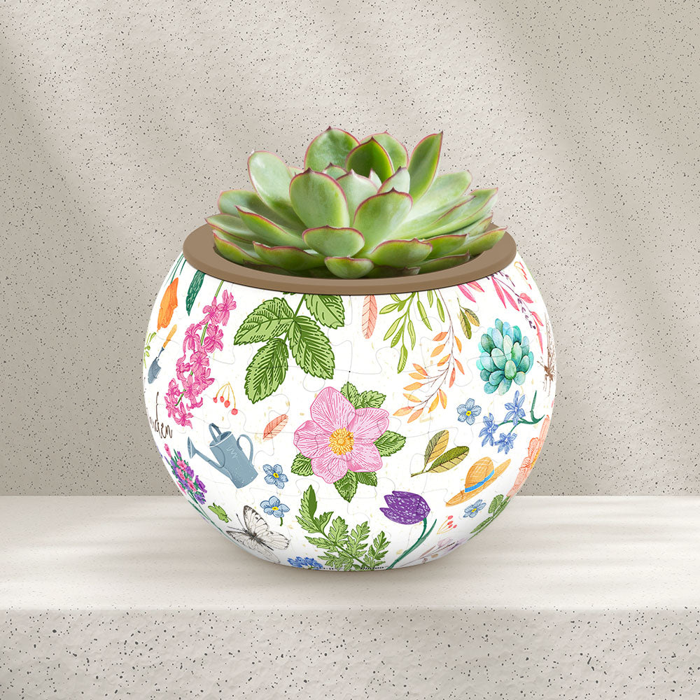 PieceRelax Puzzle Planter- Featuring vibrant flowers, butterflies, and garden tools, this planter is a cheerful addition to any space. Let PieceRelax Puzzle Planter guide you through the joy of gardening, piece by piece, ensuring you'll always get there.