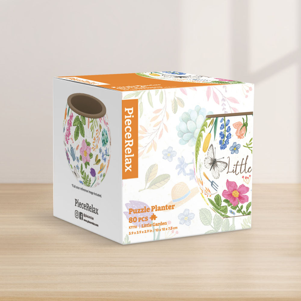 PieceRelax Puzzle Planter- Featuring vibrant flowers, butterflies, and garden tools, this planter is a cheerful addition to any space. Let PieceRelax Puzzle Planter guide you through the joy of gardening, piece by piece, ensuring you'll always get there.