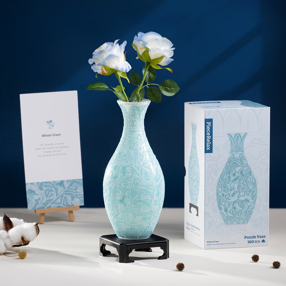 PieceRelax | Puzzle Vase - Experience the serene beauty of winter. This puzzle vase captures the crisp elegance of the season with its intricate patterns and cool, calming hues. A refined decoration that brings peaceful charm to any space. With PieceRelax, you’ll always get there.