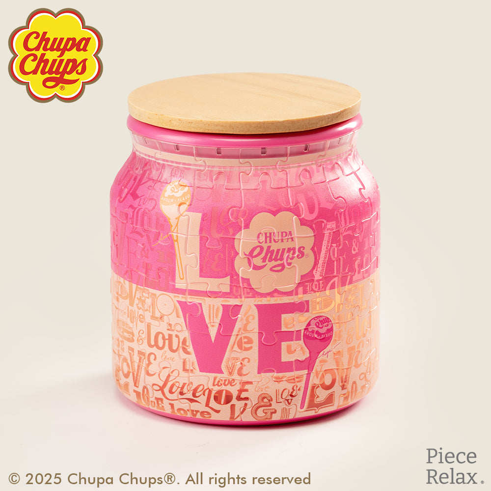 PieceRelax | Unwrap love with PieceRelax! This 96-piece jar puzzle features vibrant Chupa Chups designs and an innovative glue-free assembly. Packed in a charming reusable jar, it’s a perfect gift for spreading sweetness and love. With PieceRelax, you’ll always get there!