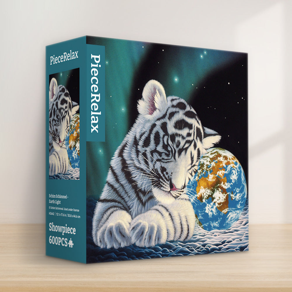 This enchanting 600-piece puzzle showcases a serene snow leopard cub cuddling the Earth, under the magical glow of the Northern Lights. Piece by piece, let the beauty of our world unfold. With PieceRelax, you’ll always get there.