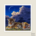 This captivating 900-piece puzzle features two tiger cubs nestled closely, basking in the peacefulness of night. Feel the warmth and comfort of this tender scene as you complete each piece. 