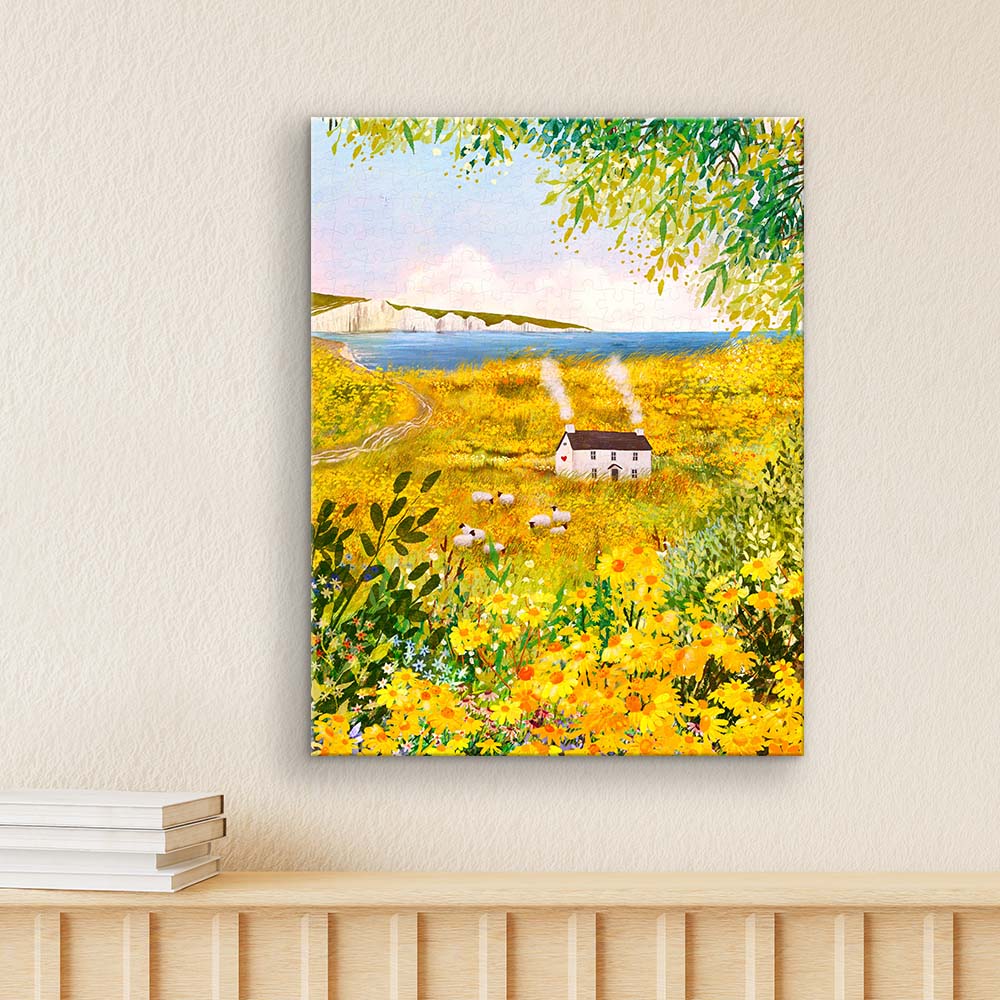 Gaze at the majestic Seven Sisters cliffs across a beautiful field of yellow blooms. A stunning coastal escape for your home.