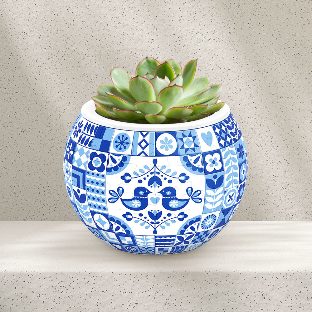 PieceRelax Puzzle Planter- Adorned with classic blue and white motifs, this planter exudes a sense of tradition and style. PieceRelax Puzzle Planter invites you to cultivate your creativity, knowing you’ll always get there.