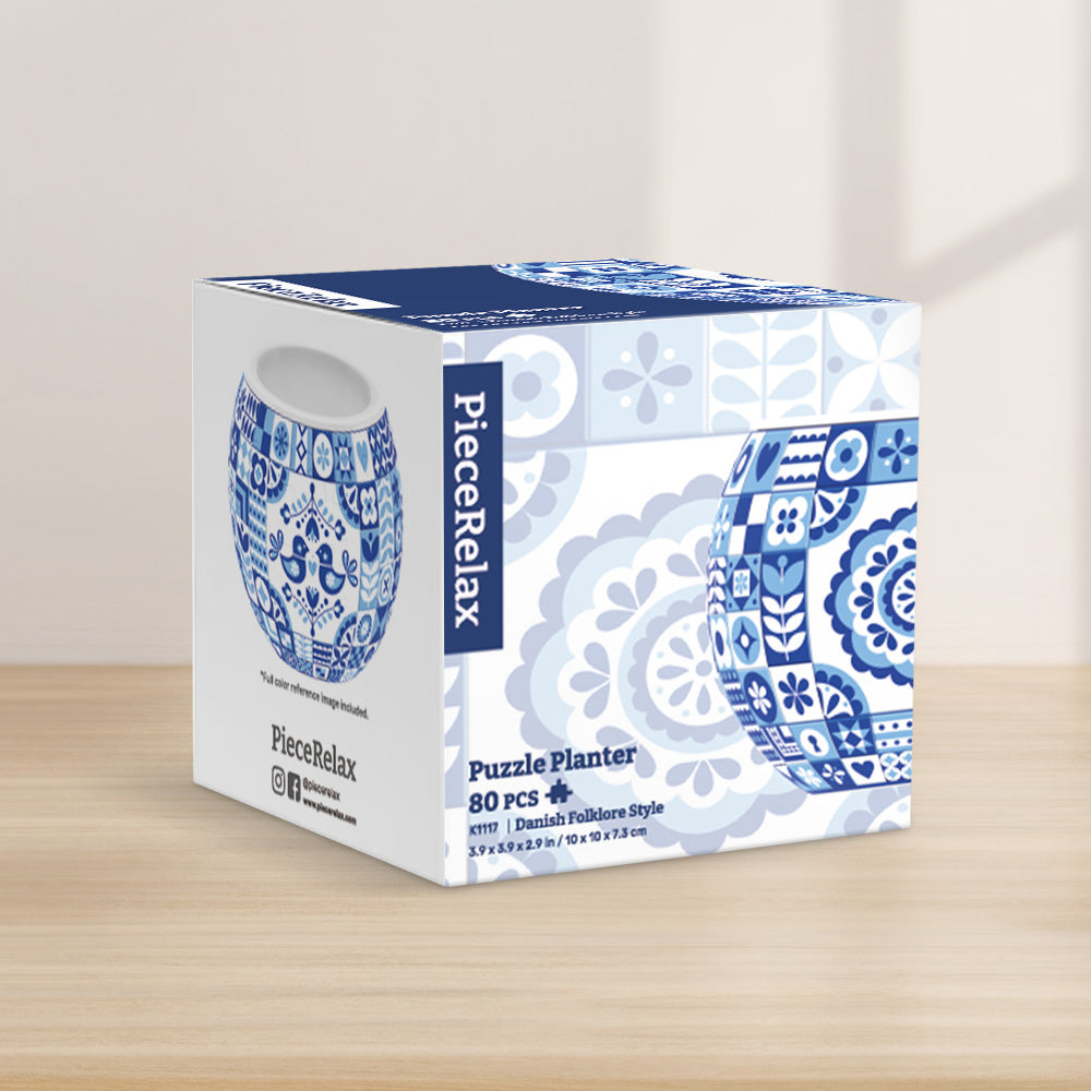 PieceRelax Puzzle Planter- Adorned with classic blue and white motifs, this planter exudes a sense of tradition and style. PieceRelax Puzzle Planter invites you to cultivate your creativity, knowing you’ll always get there.