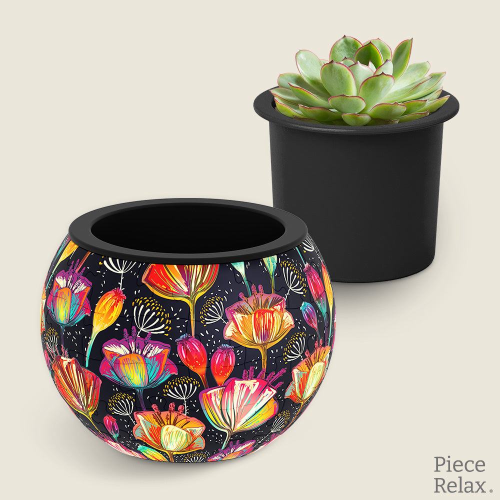 PieceRelax Puzzle Planter- Add a burst of color to your indoor garden. Featuring vivid poppies in a spectrum of colors, this planter brightens any space. Piece by piece, let PieceRelax Puzzle Planter help you create a vibrant and joyful atmosphere, knowing you’ll always get there.