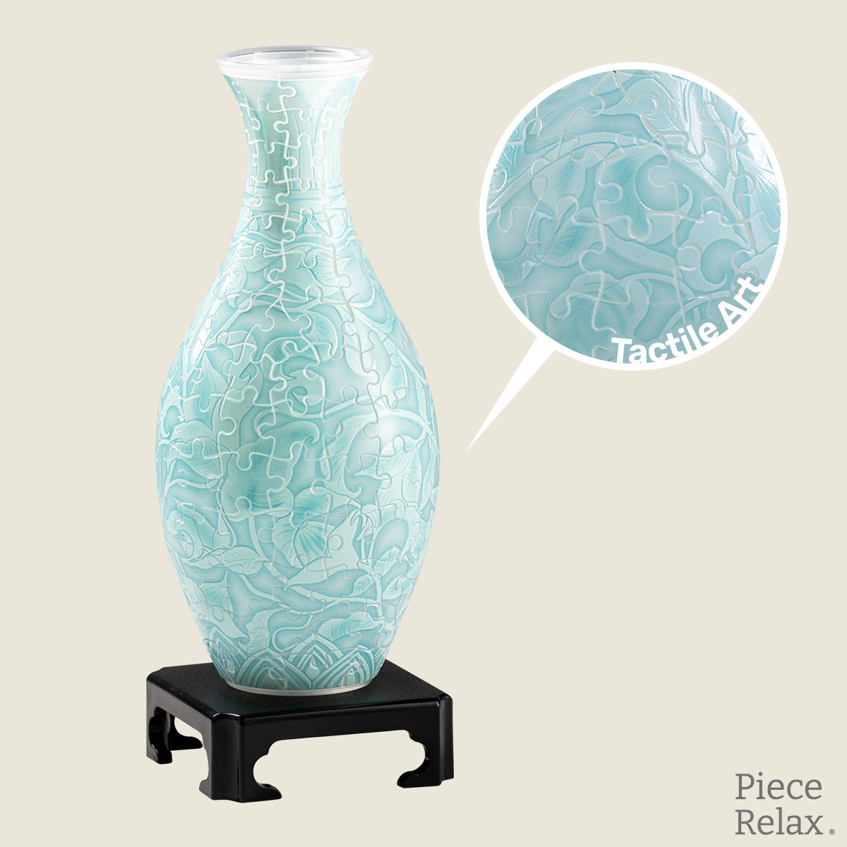 PieceRelax | Puzzle Vase -  Experience the serene beauty of winter. This puzzle vase captures the crisp elegance of the season with its intricate patterns and cool, calming hues. A refined decoration that brings peaceful charm to any space. With PieceRelax, you’ll always get there. 