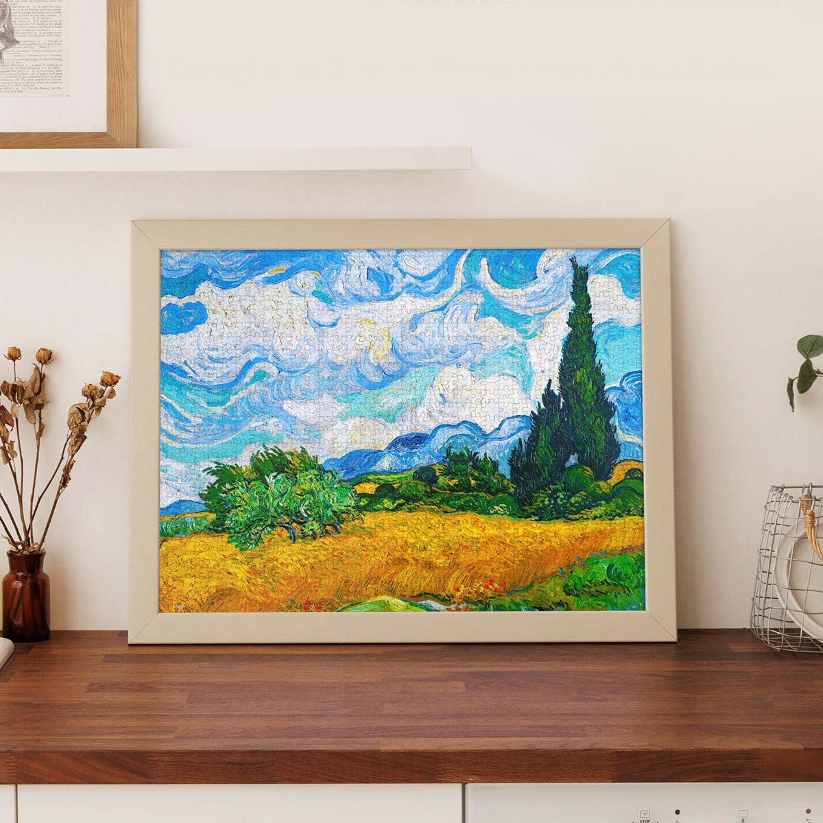 In this mesmerizing artwork, the wheat fields sway like waves beneath a swirling blue sky, while tall cypress trees stand as graceful sentinels in the wind.