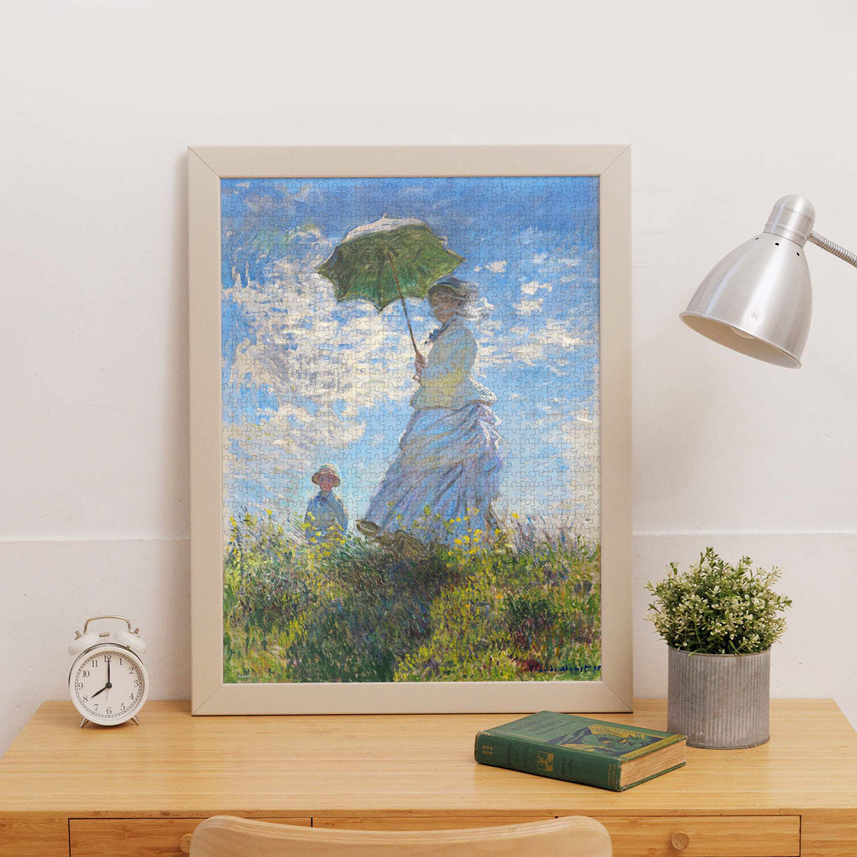 This stunning artwork captures a fleeting moment — a woman standing in the open field, her parasol lifted gently as the breeze dances through her dress and hair.