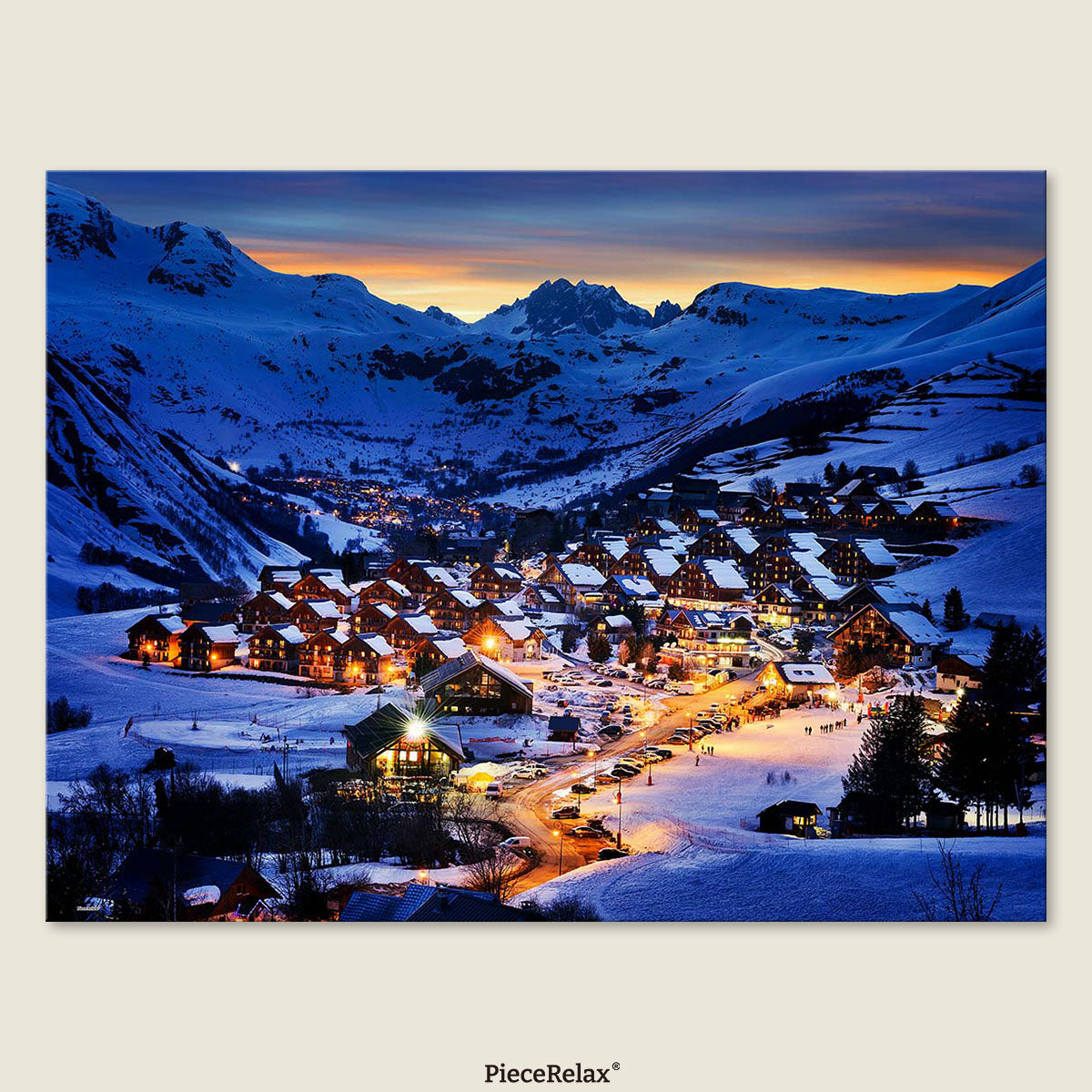 In the heart of the Alps, winter lights twinkle as miniature towns rest beneath majestic peaks.