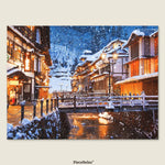 Winter in Ginzan Onsen: Steaming hot springs meet the silvery chill of snow — the perfect harmony of fire and ice.