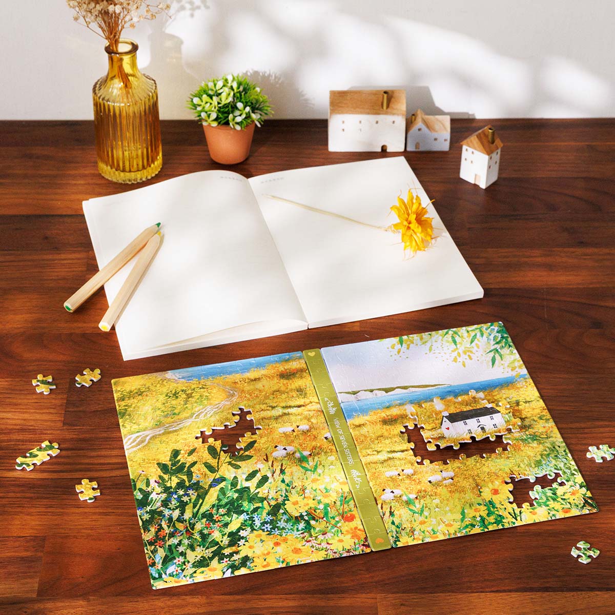 Gaze at the majestic Seven Sisters cliffs across a beautiful field of yellow blooms. A stunning coastal escape for your home.